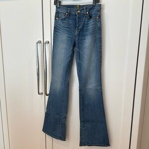 7 For All Mankind. 98% cotton, 2% spandex. Size 26. Button fly. Bootcut jeans.